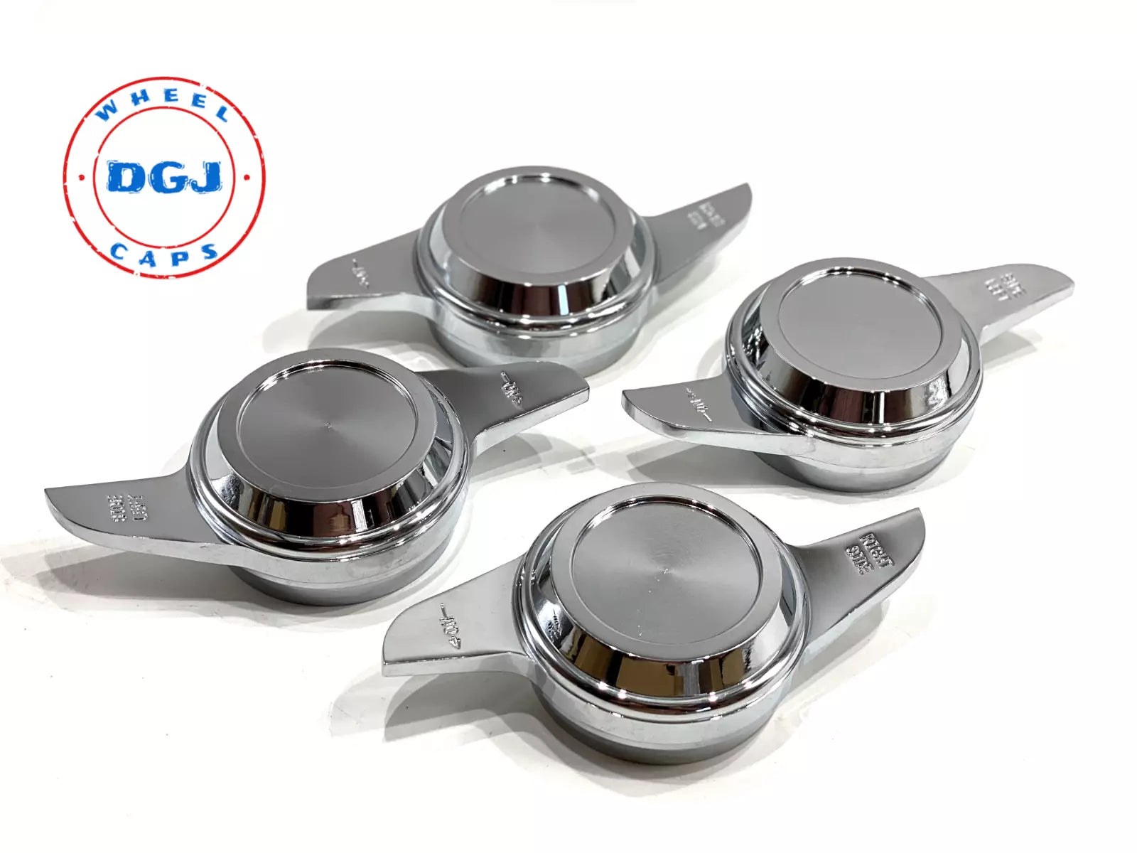 A set of four chrome knockoff spinners with a 2 bar cut design